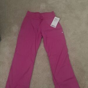 BRAND NEW  with tags  Luluemon Dance Studio mid rise pant Size 4 hot pink